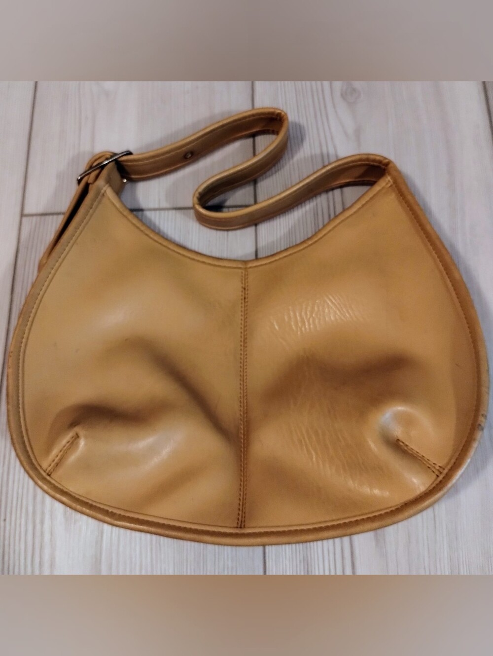 Tan Leather Crescent Shoulder Bag with Zipper Closure & Adjustable Buckle Strap
